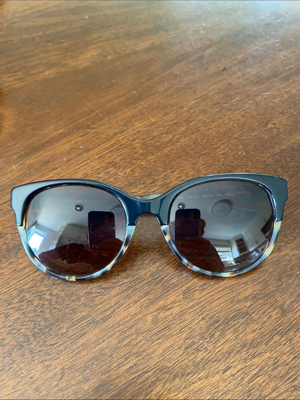 Tory Burch Black and Tortoise sunglasses.